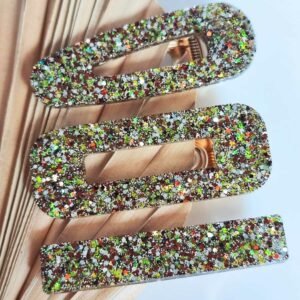 barrettes en résine Ambrelia pailletées dorées et cuivrées, créations artisanales faites main en France