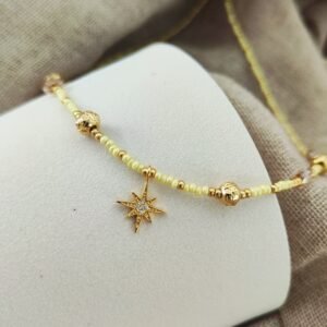 Collier Whitsunday avec perles jaunes et breloque étoile dorée sertie de zirconium